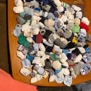 Huge lot of baby socks, some mittens( mainly boys) sizes 0-6 to 8 months